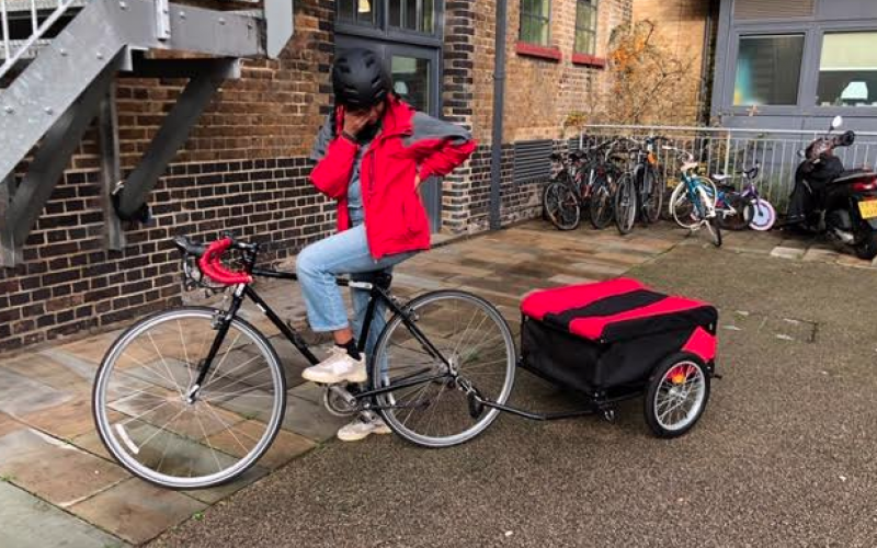 Spedal cyclist with delivery cart